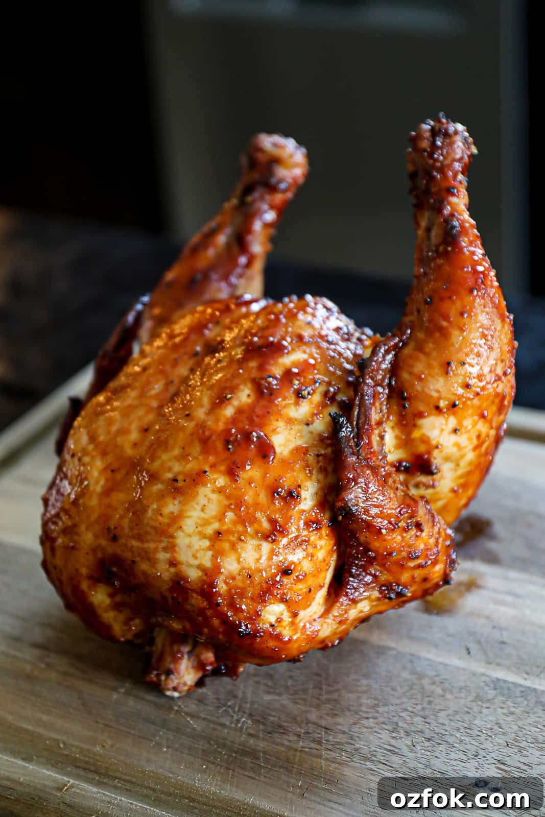 Pellet Smoker Beer-Can Chicken Recipe for Juicy, Crispy Skin 9 Pellet Grill Smoked Beer Can Chicken After Smoking And Resting On A Cutting Board