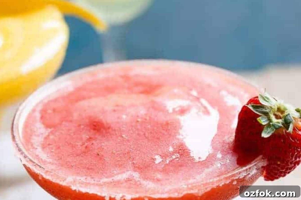 Frozen Strawberry Mango Margarita Recipe | Refreshing Summer Cocktail 5 Add the tequila, Triple Sec or Cointreau, lime juice, ice, and frozen fruit to a blender.