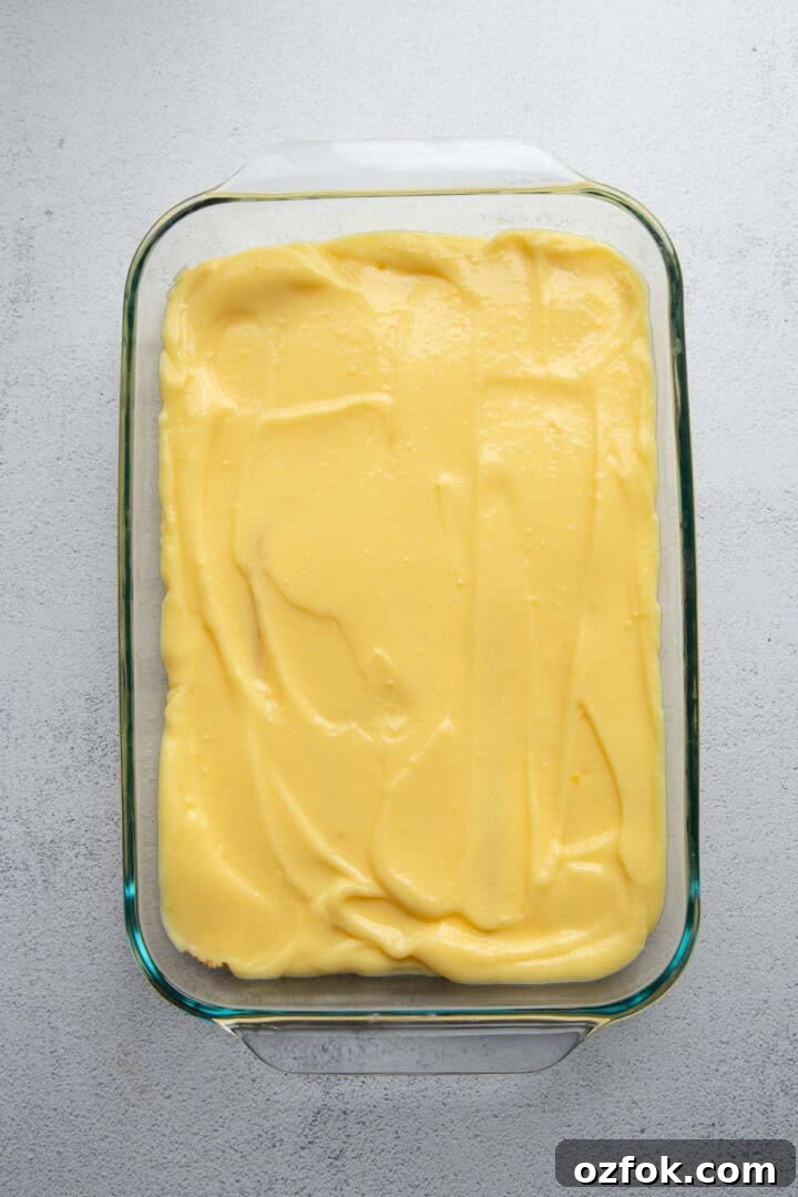 Creamy Twinkie Layer Cake Recipe You’ll Love 6 vanilla pudding in a glass dish.