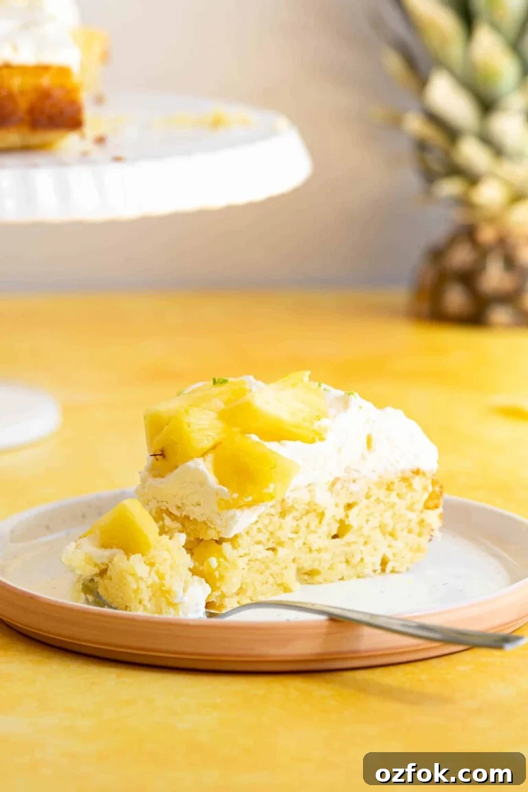 a slice of pina colada cake