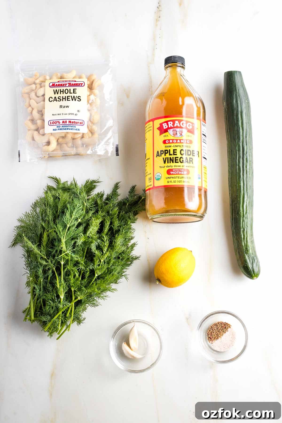 Dairy-Free Tzatziki Sauce: Authentic Vegan Greek Recipe 3 Ingredients for Tzatziki: cashews, apple cider vinegar, cucumber, fresh dill, lemon, garlic cloves, salt and pepper.