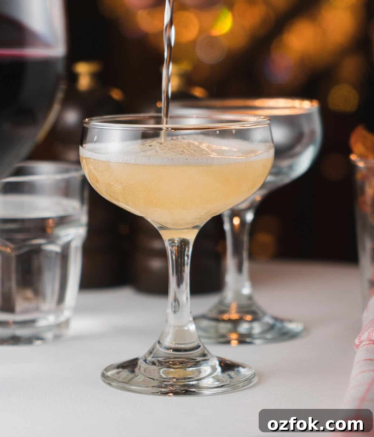 Guide to Cocktail Glasses: Styles, Uses, and Cocktail Pairings 5 Coupe glass with a cocktail.