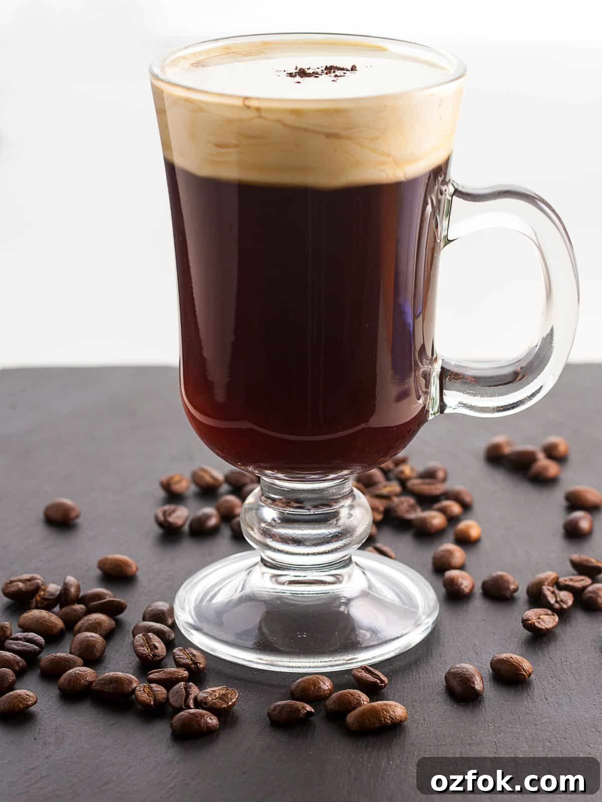 Guide to Cocktail Glasses: Styles, Uses, and Cocktail Pairings 8 An Irish coffee in a coffee mug.