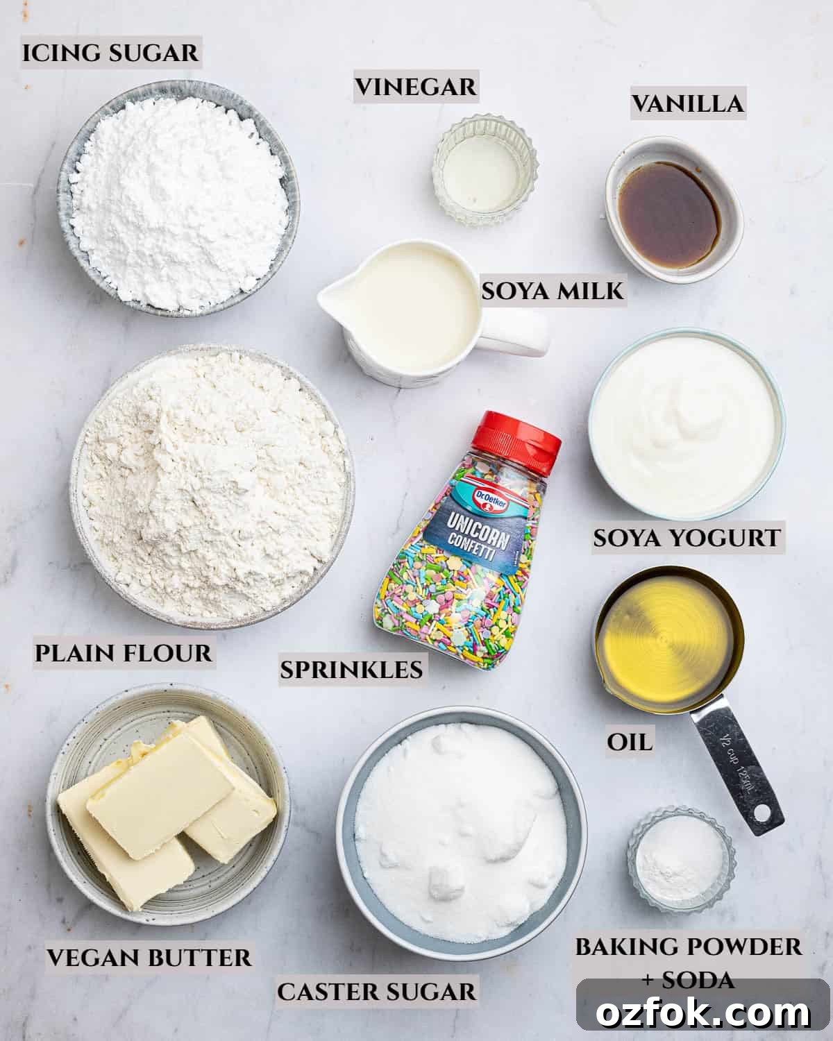 Vegan Birthday Cake Ideas for School Parties 3 A labelled photo of the ingredients needed to make vegan school cake.