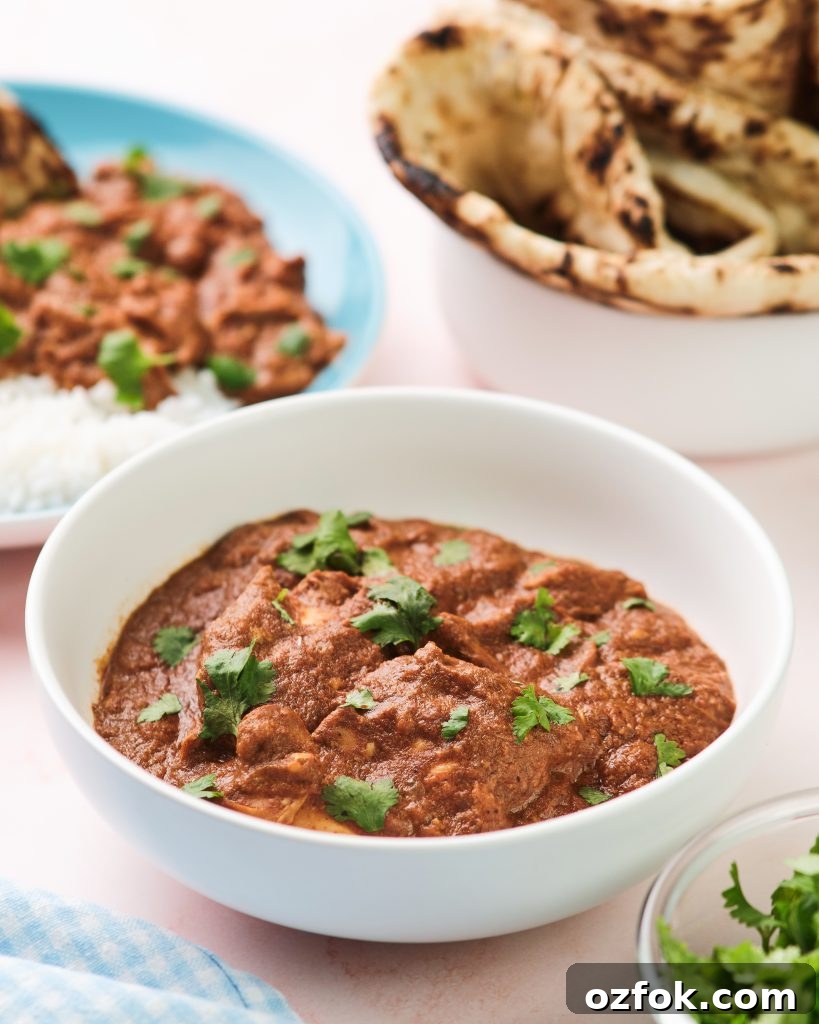 Slow Cooker Chicken Tikka Masala Recipe for Tender, Creamy Curry 3 chicken tikka masala in a serving bowl