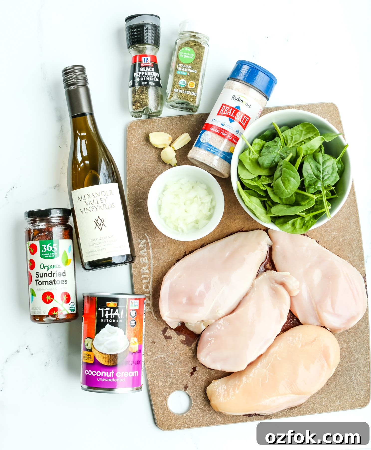 Tuscan-Style Dairy-Free Chicken with Sun-Dried Tomatoes and Herbs 4 recipe ingredients overhead shot