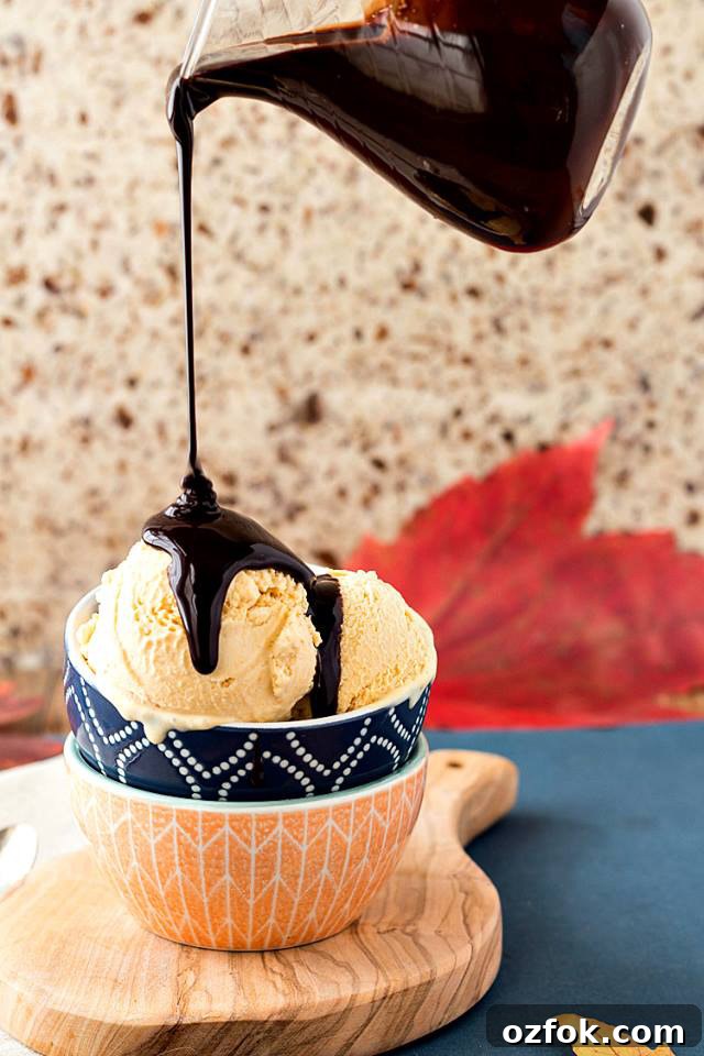 Pumpkin Cardamom Orange Ice Cream with Maple Chocolate Sauce 2 Pouring chocolate sauce over Pumpkin Cardamom-Orange No Churn Ice Cream with Maple Chocolate Sauce; © 2016 Jenni Field, Pastry Chef Online