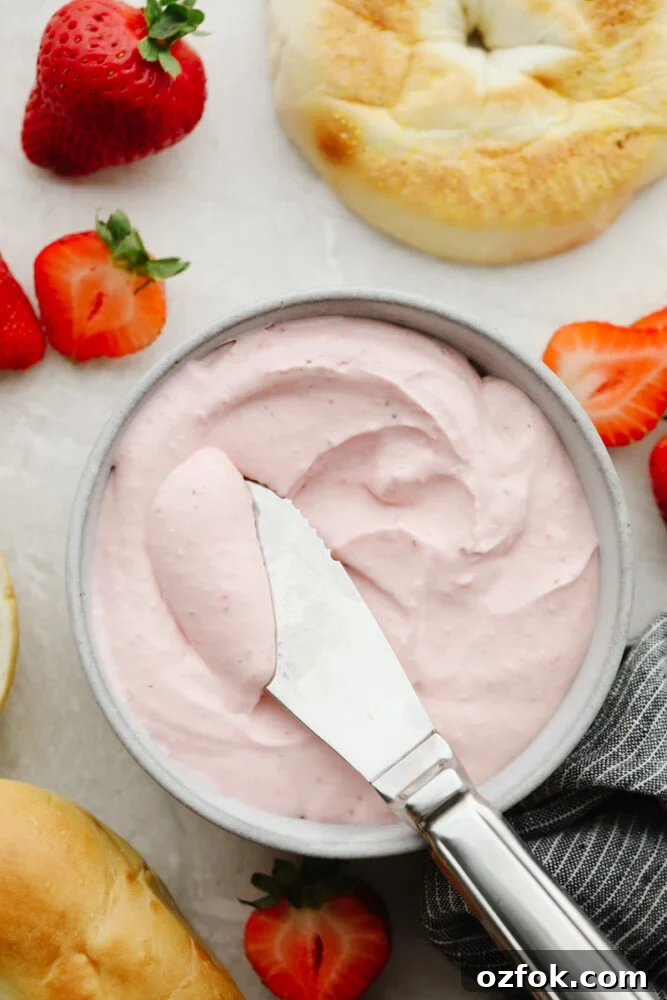 Strawberry cream cheese Strawberry cream cheese in a bowl with a butter knife.