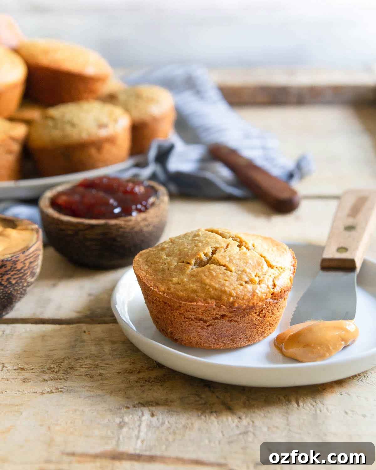Tender peanut butter muffins with a surprise strawberry jelly center make the perfect snack.