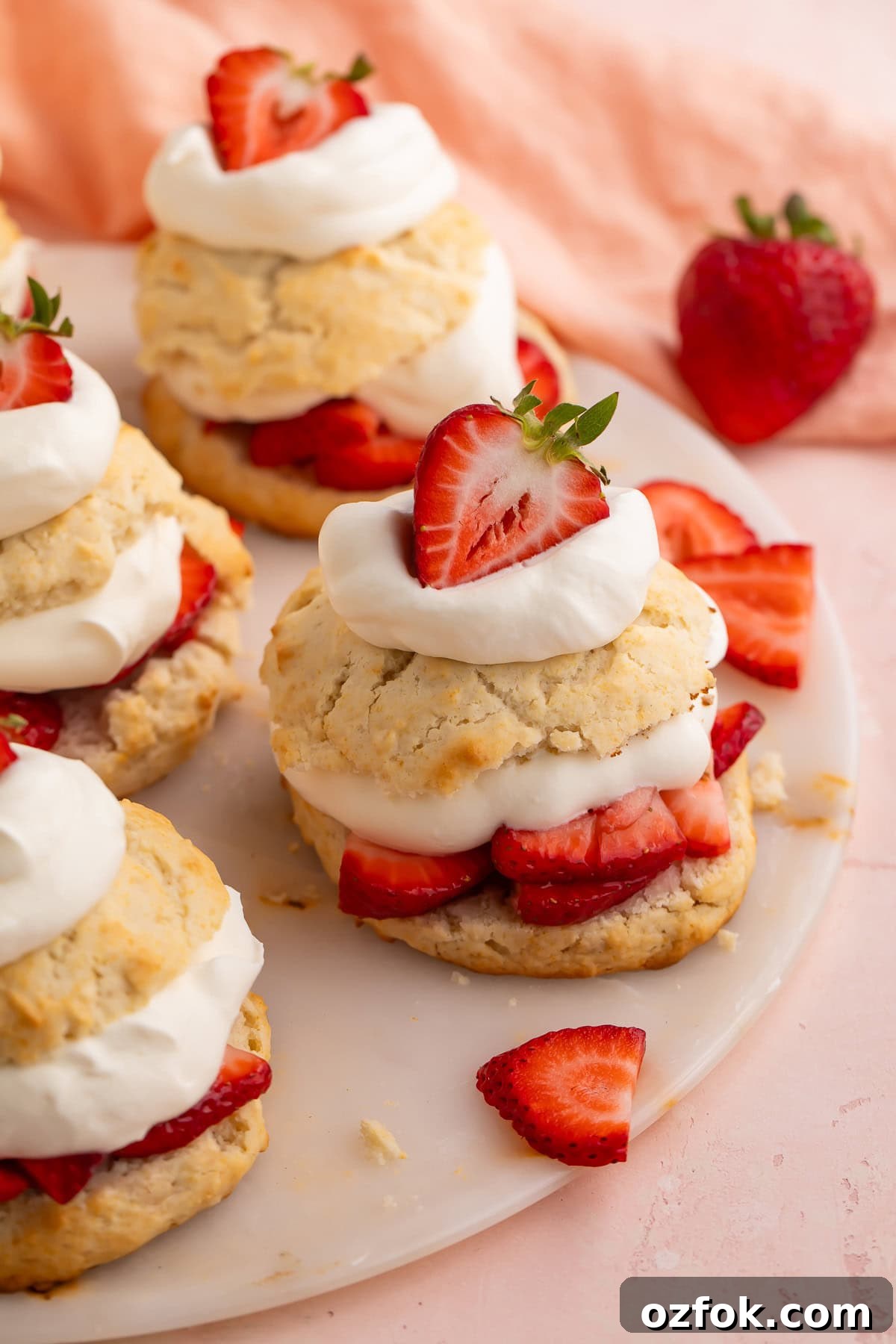 Vegan Strawberry Shortcake Recipe — Light, Creamy & Fresh 3 Vegan strawberry shortcake made with biscuits, sliced strawberries, and cream.