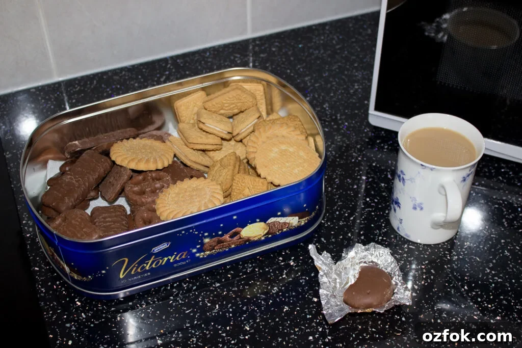 Grandma’s Incredible Ham and Cheese Quiche Recipe 8 A tin of biscuits and a cup of tea on Gran's kitchen worktop