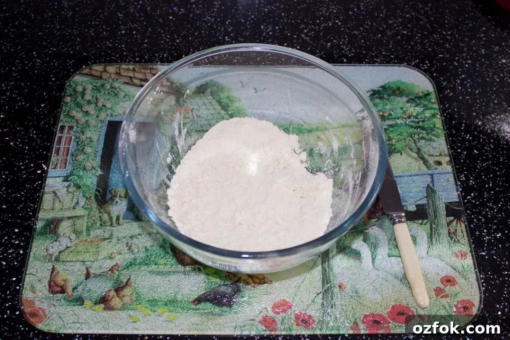Grandma’s Incredible Ham and Cheese Quiche Recipe 9 Flour, Trex and salt in a mixing bowl