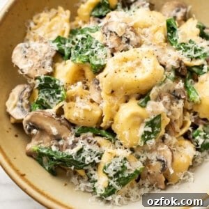One-Pan Creamy Tortellini with Spinach & Mushrooms 8 a bowl with spinach mushroom tortellini