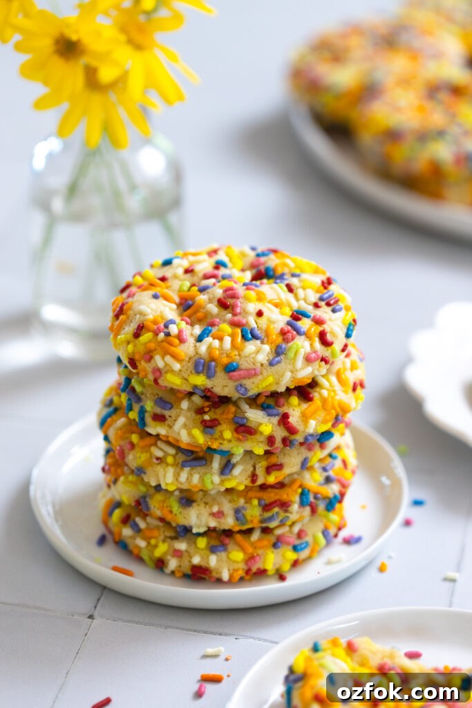 Lemon Rainbow Sprinkle Cookies Recipe — Bright Citrus Sugar Cookies 26 Lemon Rainbow Sprinkle Cookies stacked