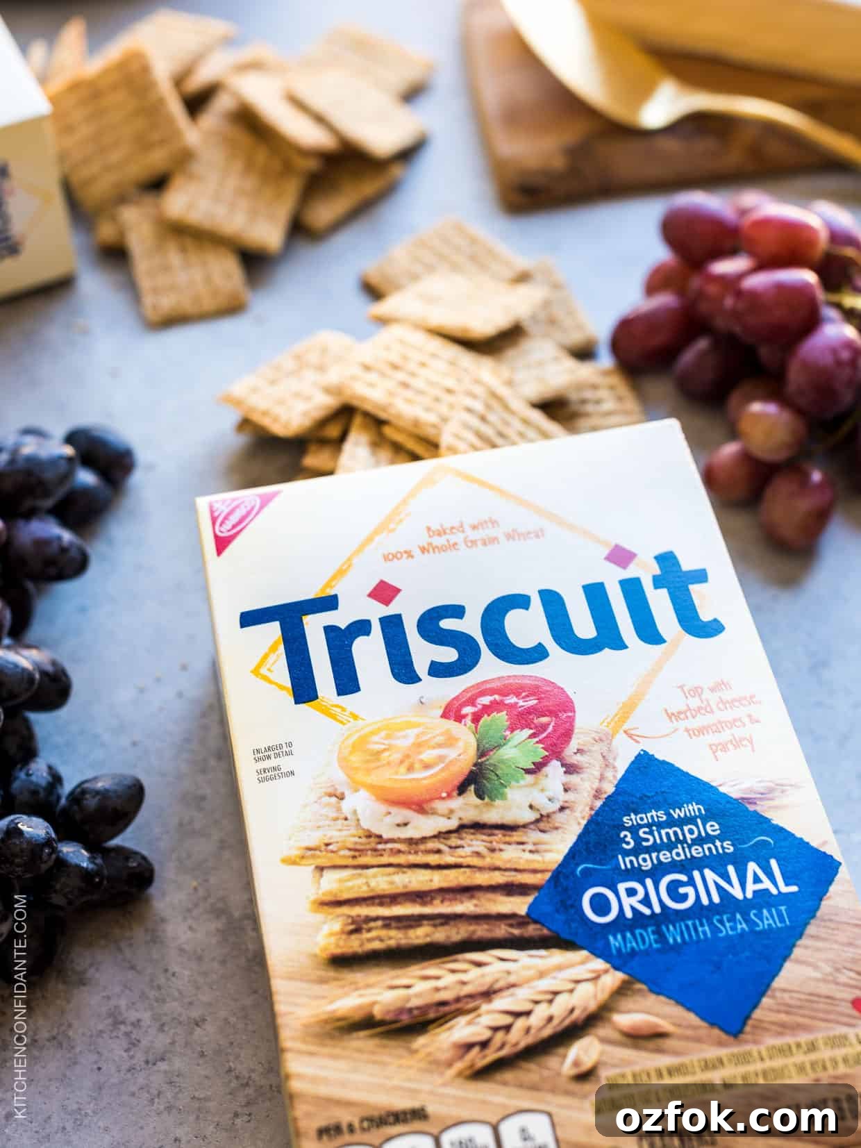 Caramelized Grape, Brie & Walnut Crostini Bites for Entertaining 5 Box of Triscuit crackers spilling onto counter top.