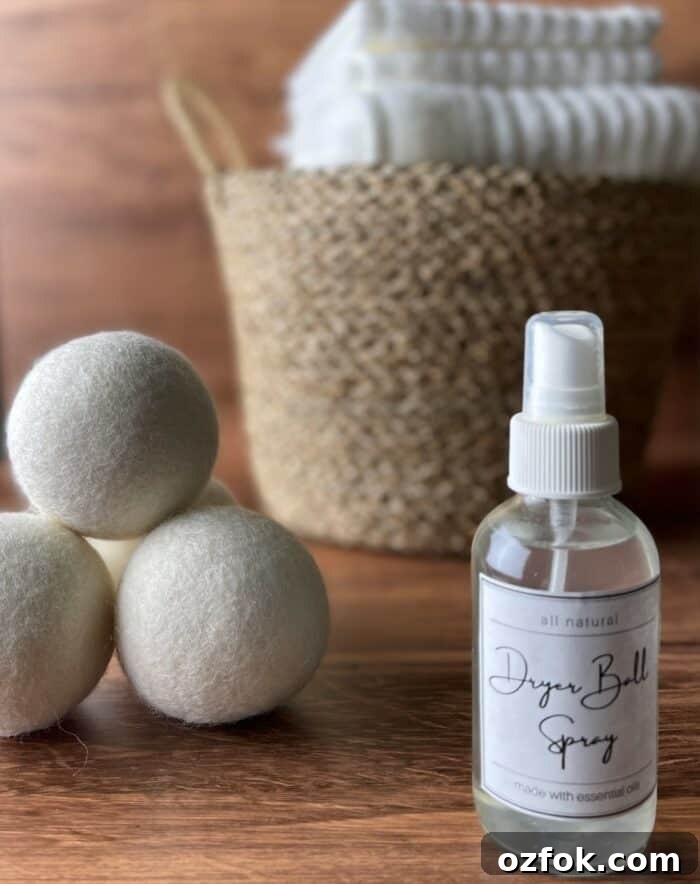 DIY Dryer Ball Spray with Essential Oils for Fresh Laundry 7 homemade dryer ball spray with 3 wool dryer balls and laundry basket