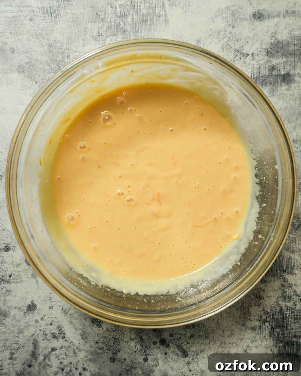 Meyer Lemon Pie with Honey Graham Cracker Crust Recipe 5 A glass bowl with meyer lemon pie filling.