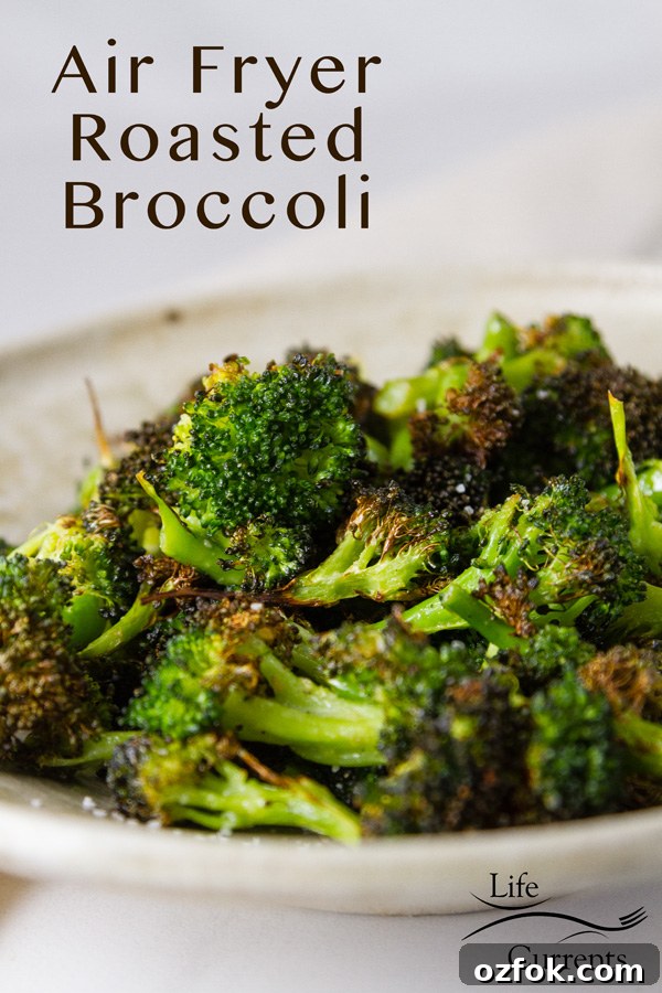 Crispy Air Fryer Roasted Broccoli Recipe 2 Air Fryer Roasted Broccoli in a white bowl