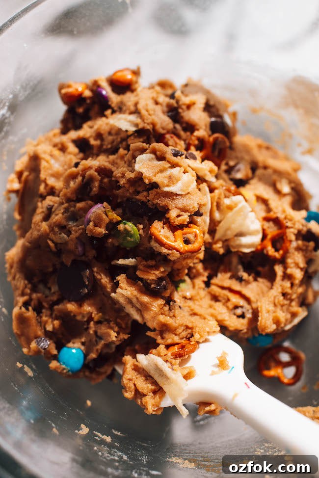 Ultimate Kitchen Sink Cookie Bars Recipe — Loaded with Mix-Ins 8 Sliced cookie bars