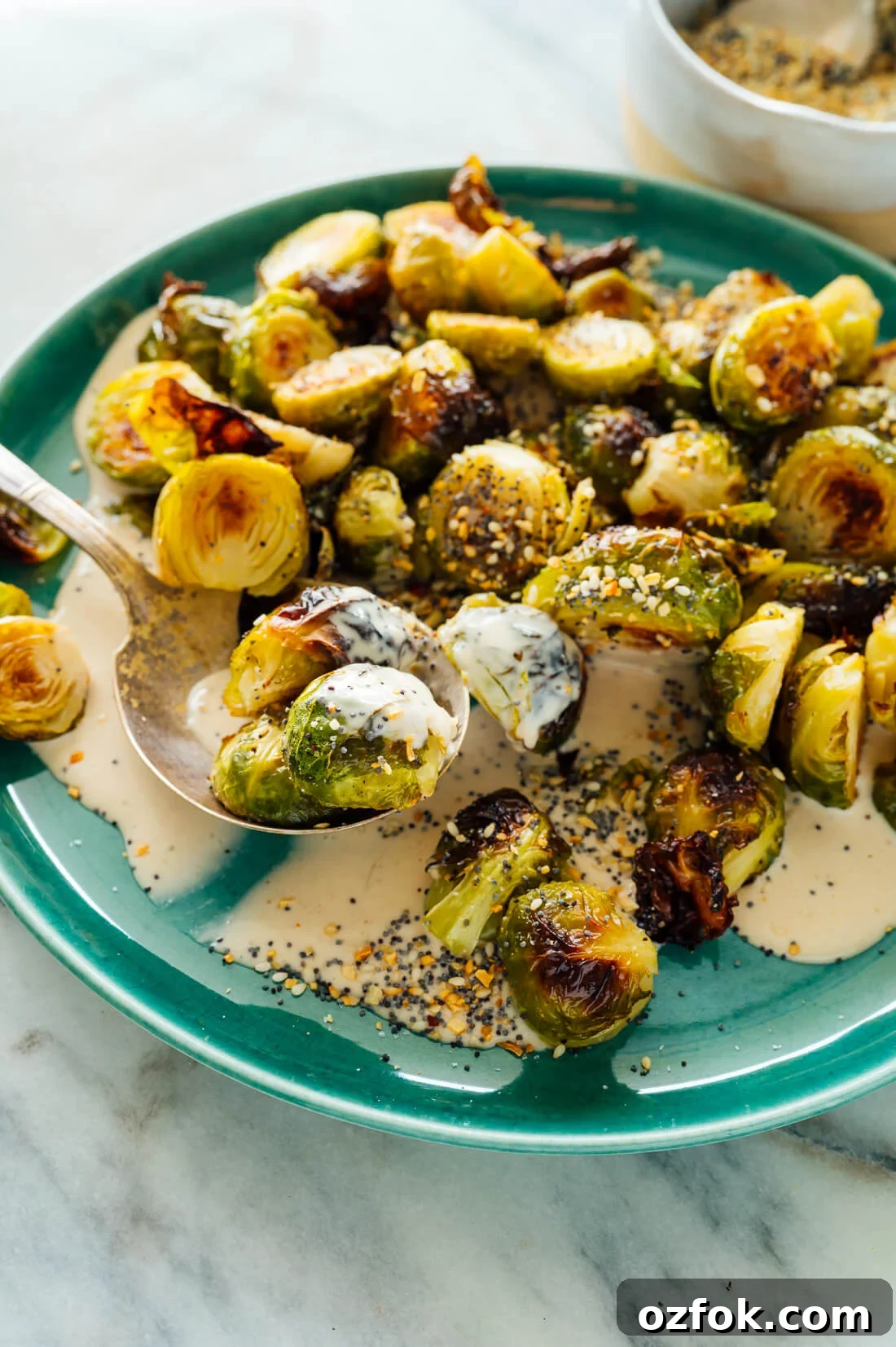 Crispy Oven-Roasted Brussels Sprouts with Balsamic Glaze 6 Roasted Brussels sprouts variation with tahini sauce