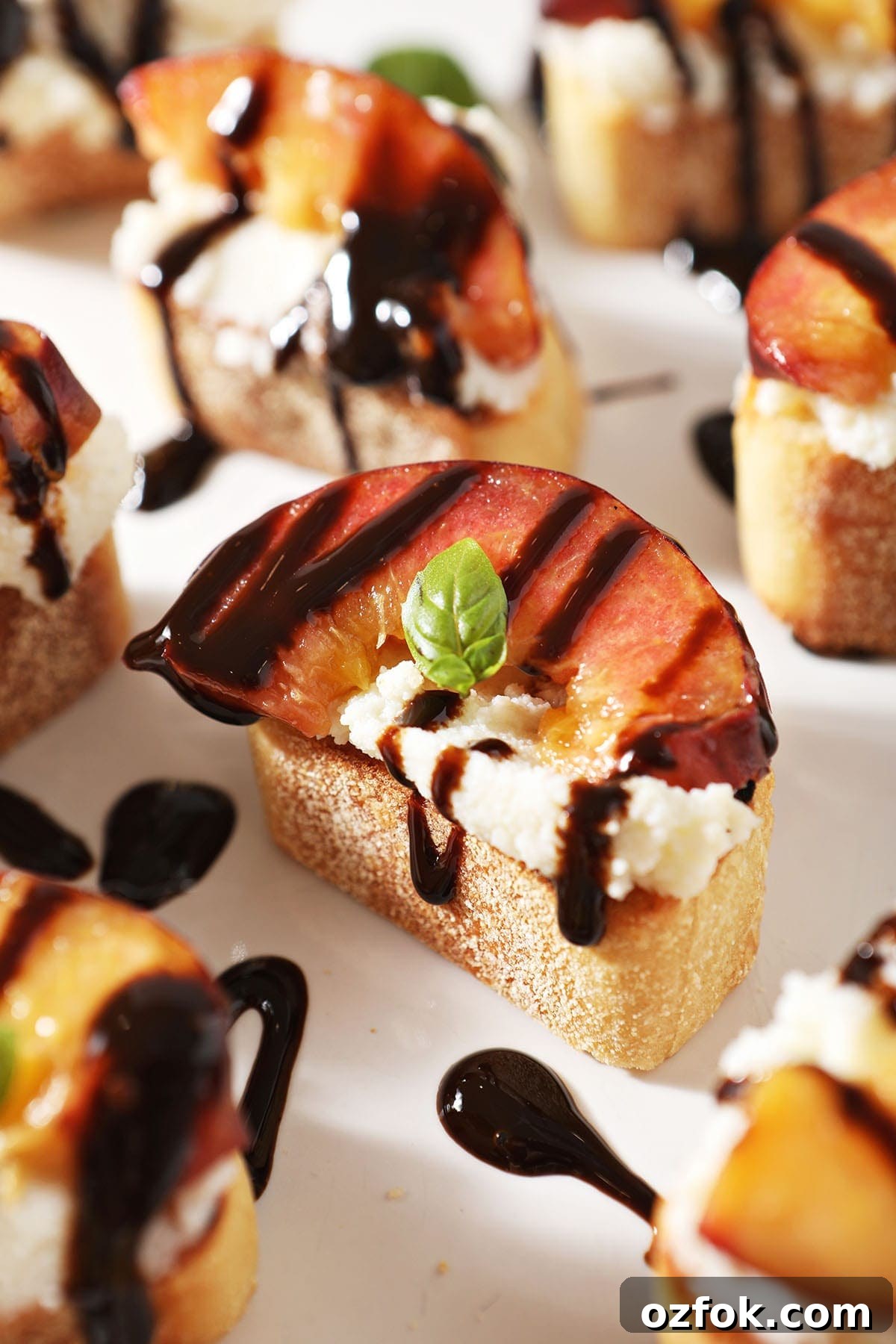 20+ Fourth of July Grilling Recipes for Your Backyard BBQ 6 Close up of a Ricotta Crostini with a Grilled Peach