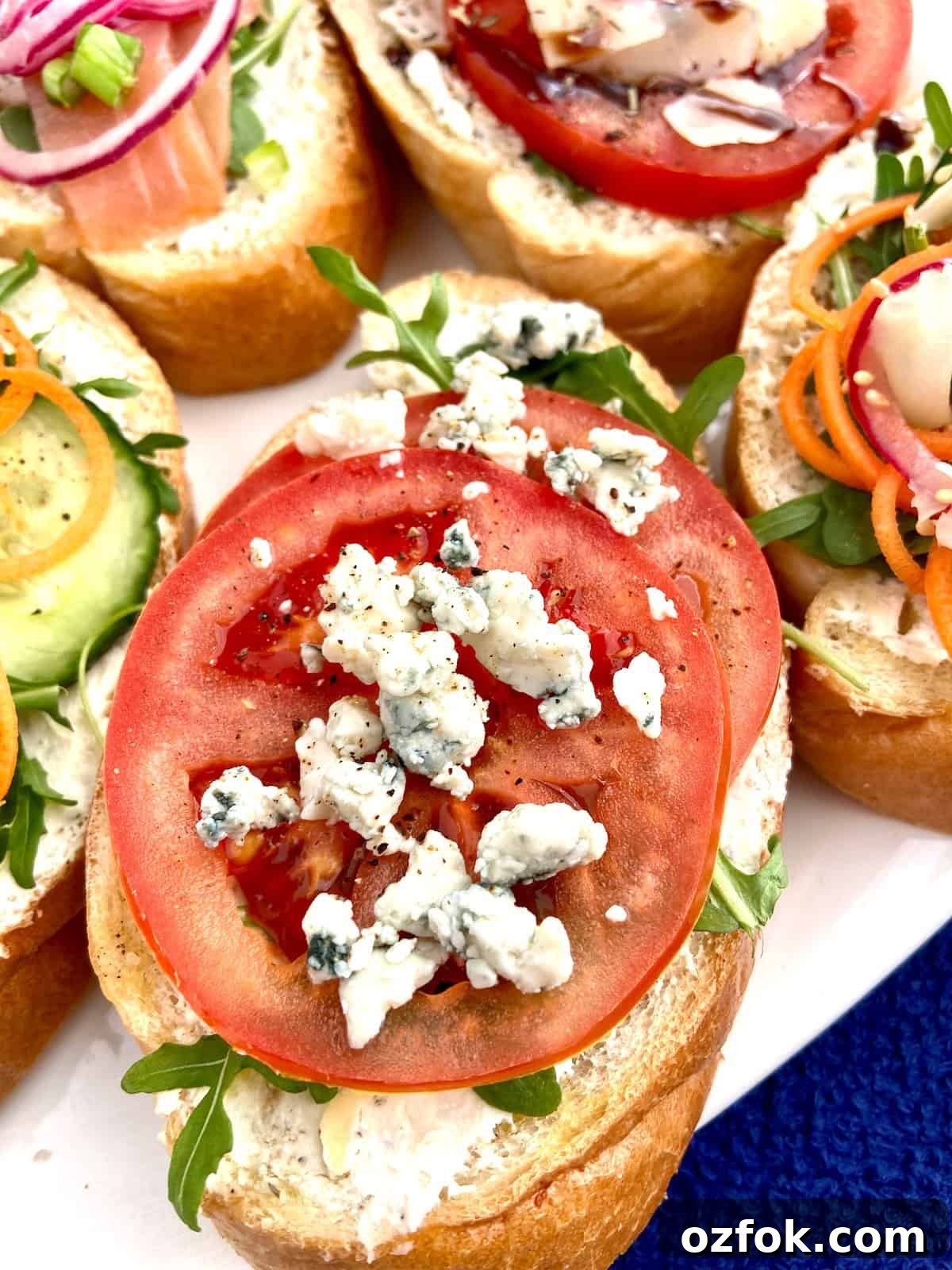 8 Flavorful Vegetarian Bruschetta Toppings for Every Occasion 9 Tomato and crumbled blue cheese on bruschetta.