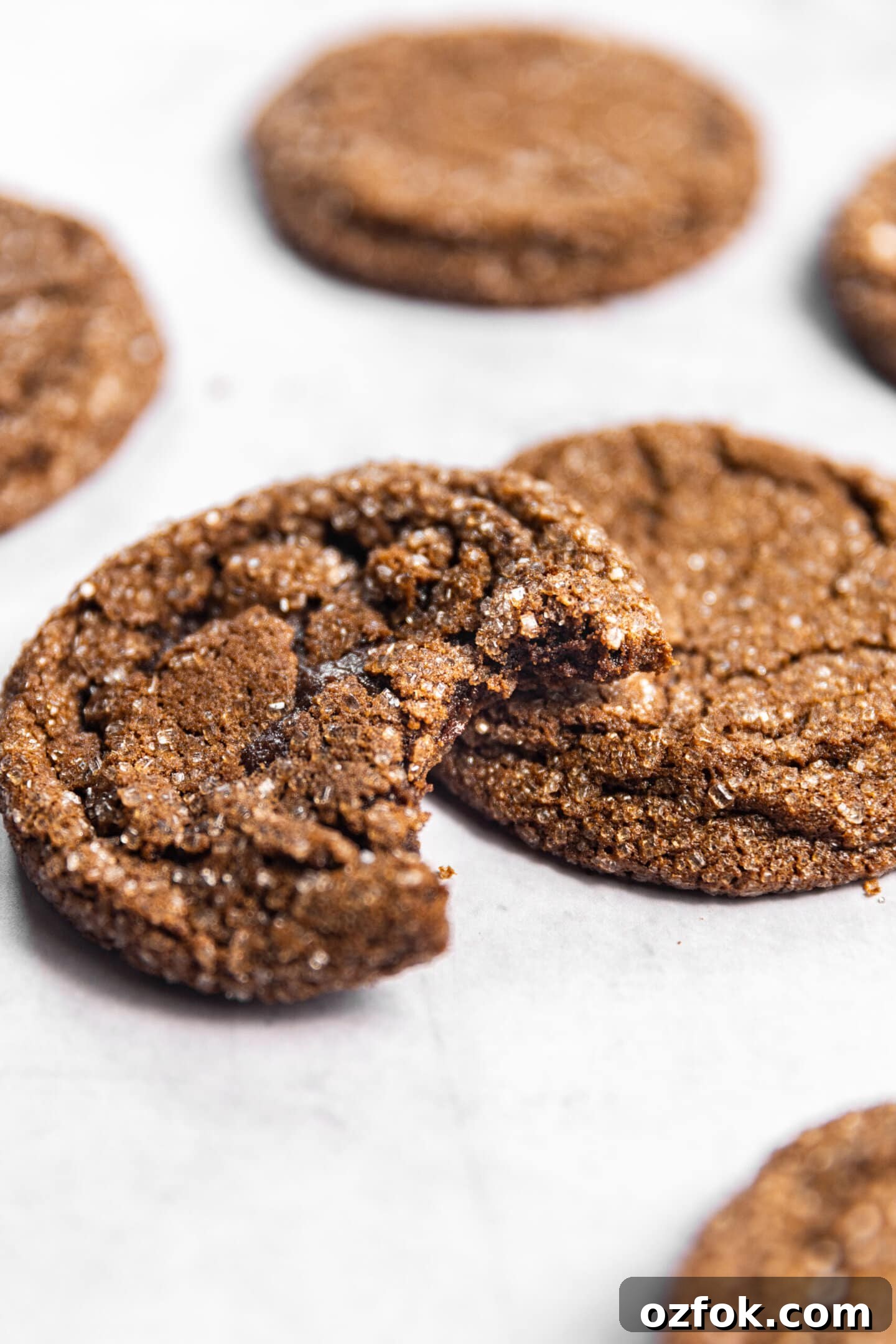 Close up of Drop-Style Chocolate Sugar Cookies with a bite missing from one