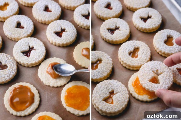 Classic Linzer Cookies Recipe: How to Make the Traditional Austrian Jam-Filled Biscuit 8 Process photos of filling linzer cookies.