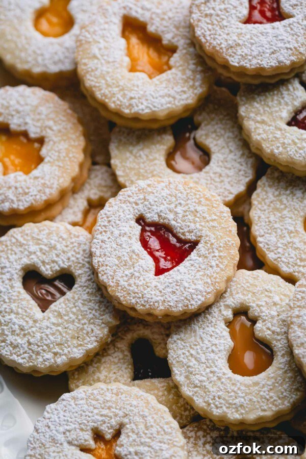 Classic Linzer Cookies Recipe: How to Make the Traditional Austrian Jam-Filled Biscuit 9 Linzer cookies filled with jam, nutella and dulce de leche.