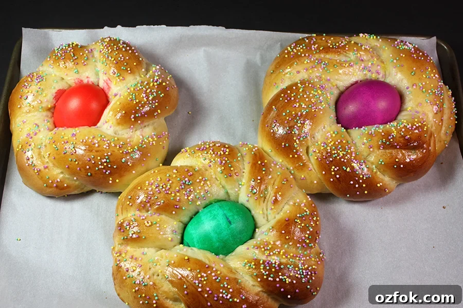 Italian Easter Bread on a parchment lined baking sheet.