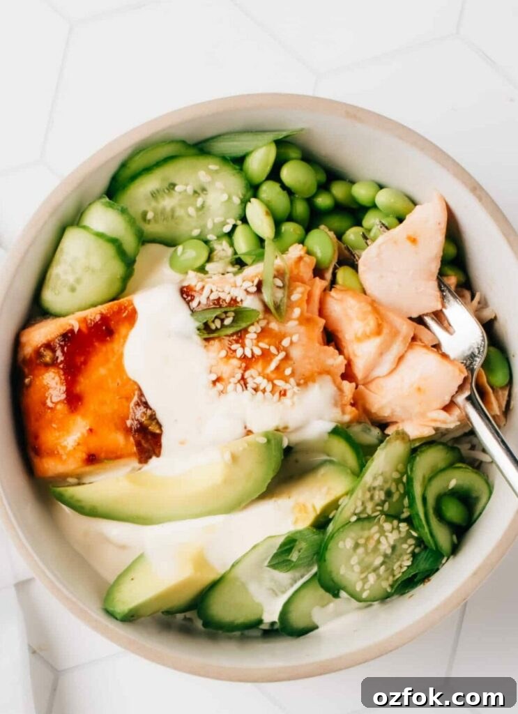 Moist Salmon Recipes That Stay Tender Every Time — Pro Tips Included 3 Honey Teriyaki Salmon Bowl with green vegetables and sauce.