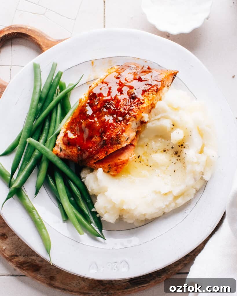 Moist Salmon Recipes That Stay Tender Every Time — Pro Tips Included 4 Cajun Honey Butter Salmon on mashed potatoes with green beans.