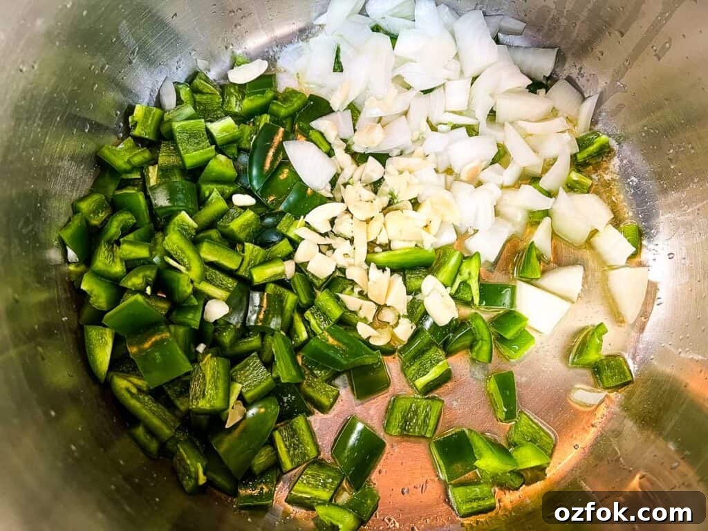 Creamy Jalapeño Soup Recipe: Smooth, Spicy, and Cozy 5 Sauteing the onions and jalapenos in the butter.