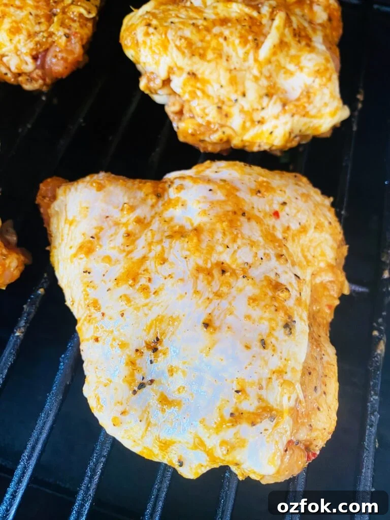 Smoked Cajun Chicken Thighs Recipe: Juicy, Spiced & Smoky 4 chicken on the smoker before cooking