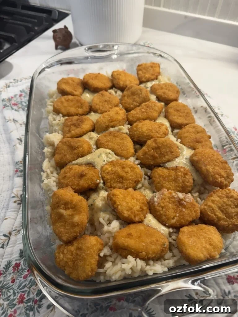 Creamy Chicken Kiev Casserole Bake 8 Chicken nuggets over the rice