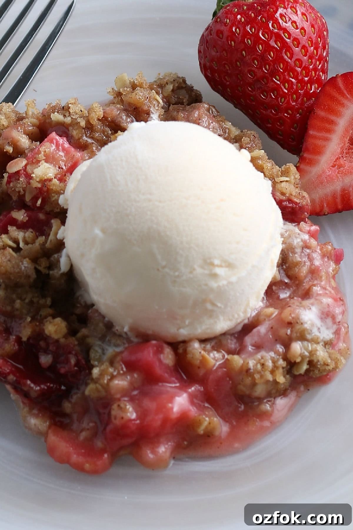 Strawberry Rhubarb Crisp is a delicious and easy Summer dessert. Strawberry Rhubarb Crisp