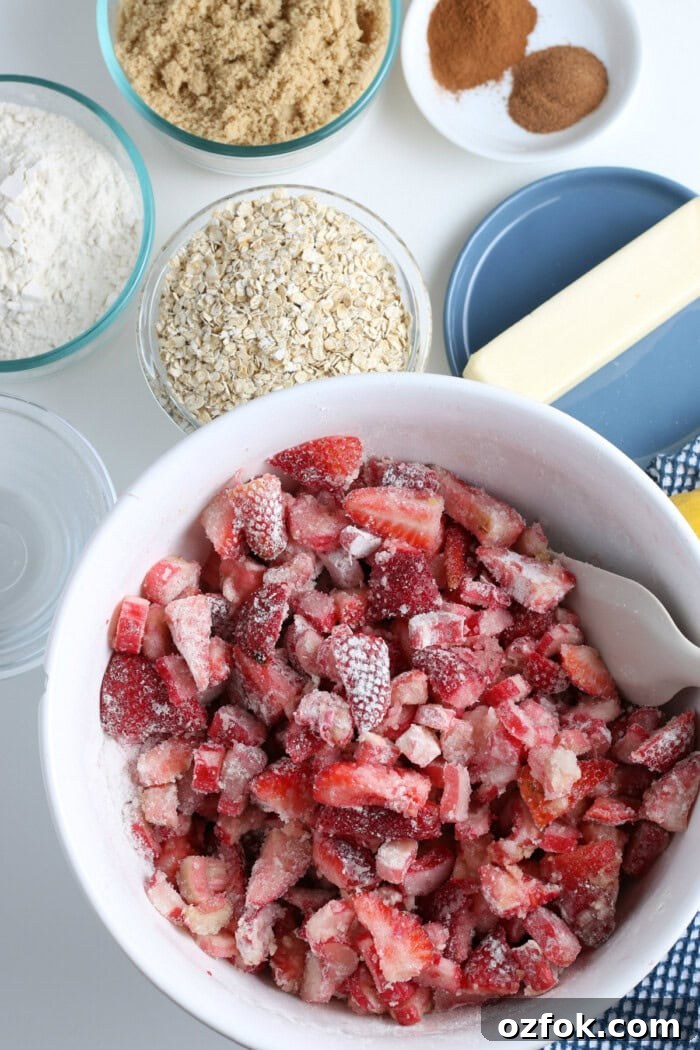 Mix fruit and sugar mixing the fruit and sugars in a bowl