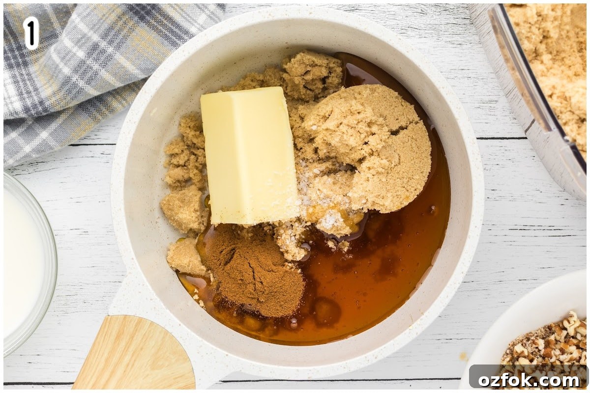 Pecan Pie Cookie Recipe: Chewy Cookies with Cinnamon Glaze 7 A white saucepan with butter, sugar and honey.
