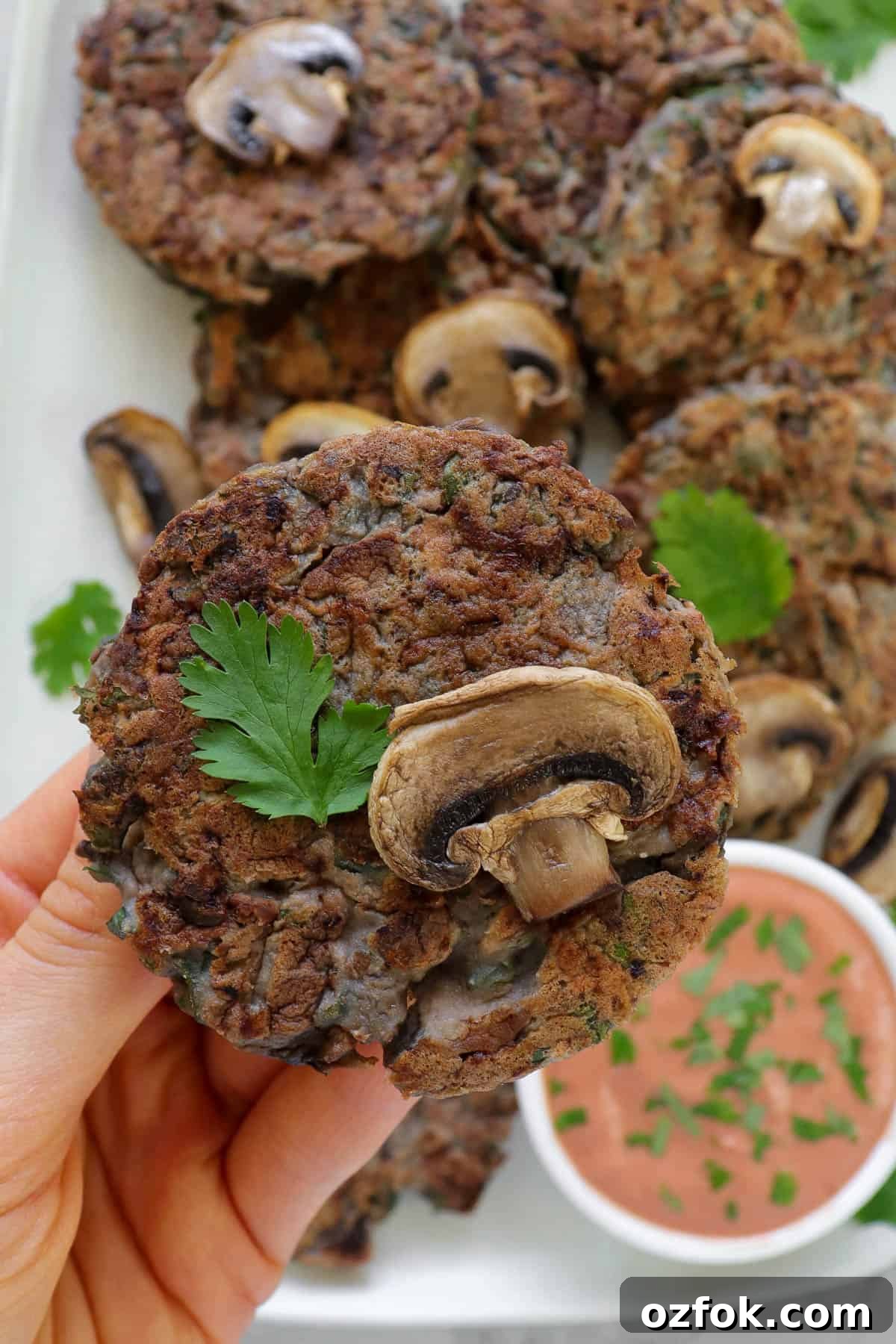 Gluten-Free Miso Mushroom Fritters — Crispy Savory Bites 4 Close up shot of fritter in hand.