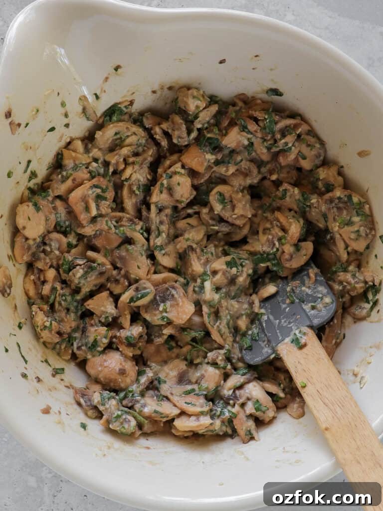 Gluten-Free Miso Mushroom Fritters — Crispy Savory Bites 6 Ingredients in mixing bowl with spatula.