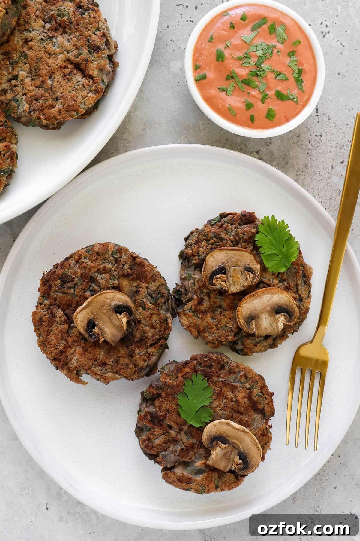 Gluten-Free Miso Mushroom Fritters — Crispy Savory Bites 8 Three fritters on plate with gold fork.