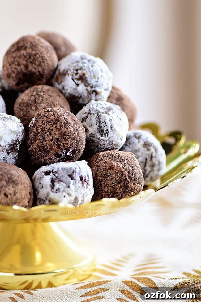 Holiday Rum Balls Recipe with Video Tutorial 3 easy Rum Balls piled on gold tray