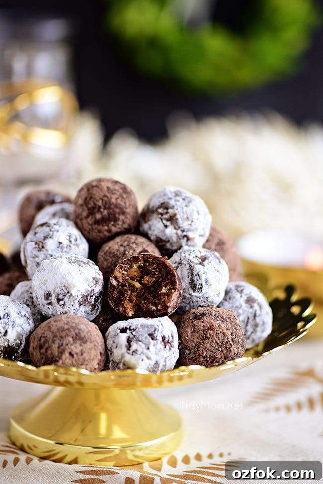 Holiday Rum Balls Recipe with Video Tutorial 4 Rum Balls stacked on a gold cake stand