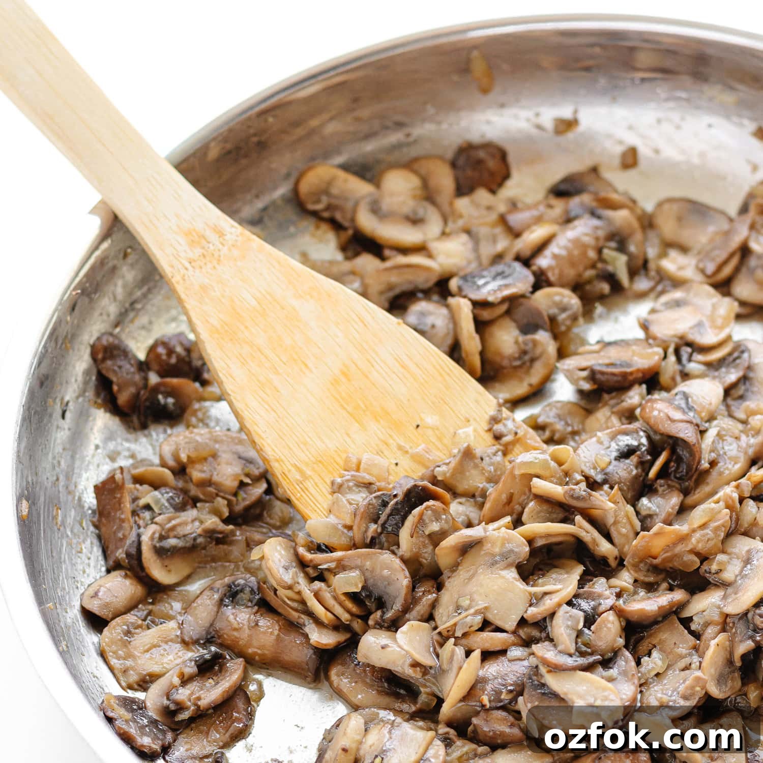 Creamy Halloumi Stroganoff with Mushrooms and Thyme 7 Deglazing pan of sautéed mushrooms, onions and garlic with some dry sherry.