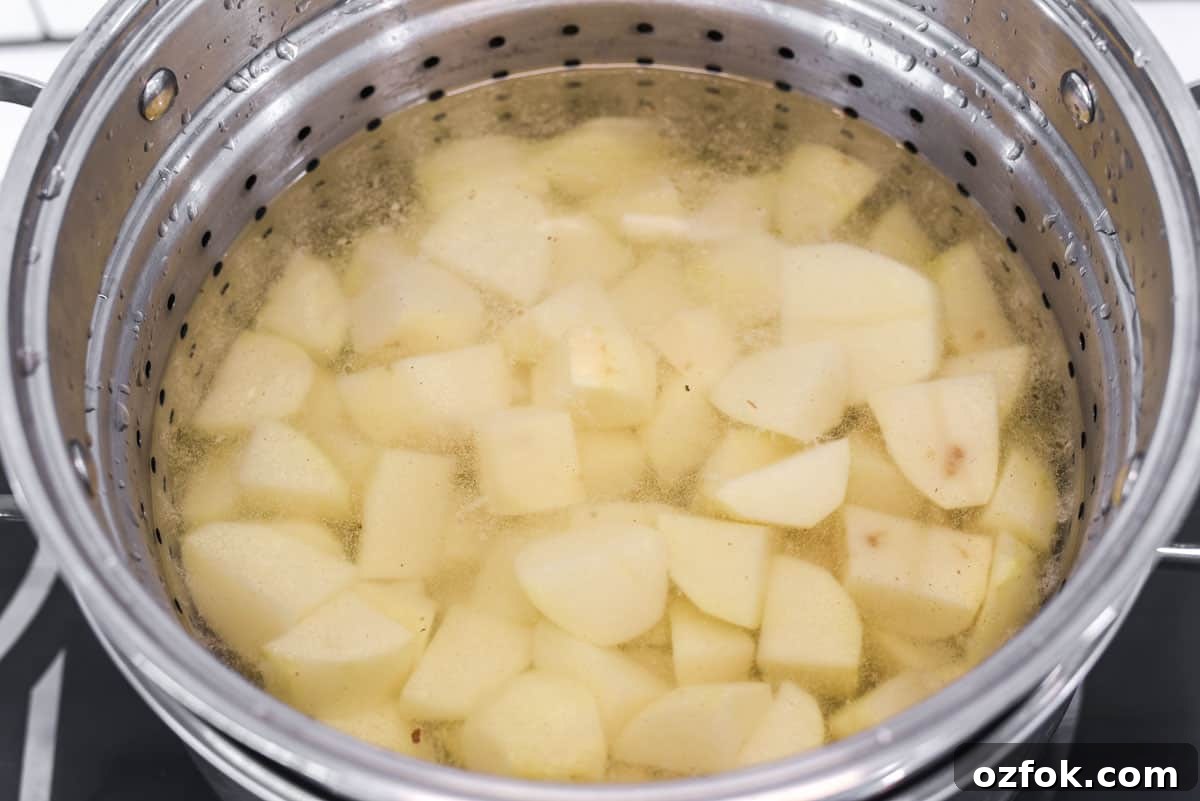 Boiling potatoes in water in large stock pot.