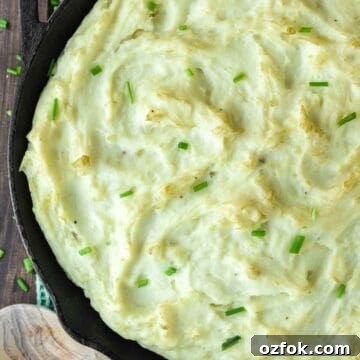 Cast iron skillet with smoked mashed potatoes.