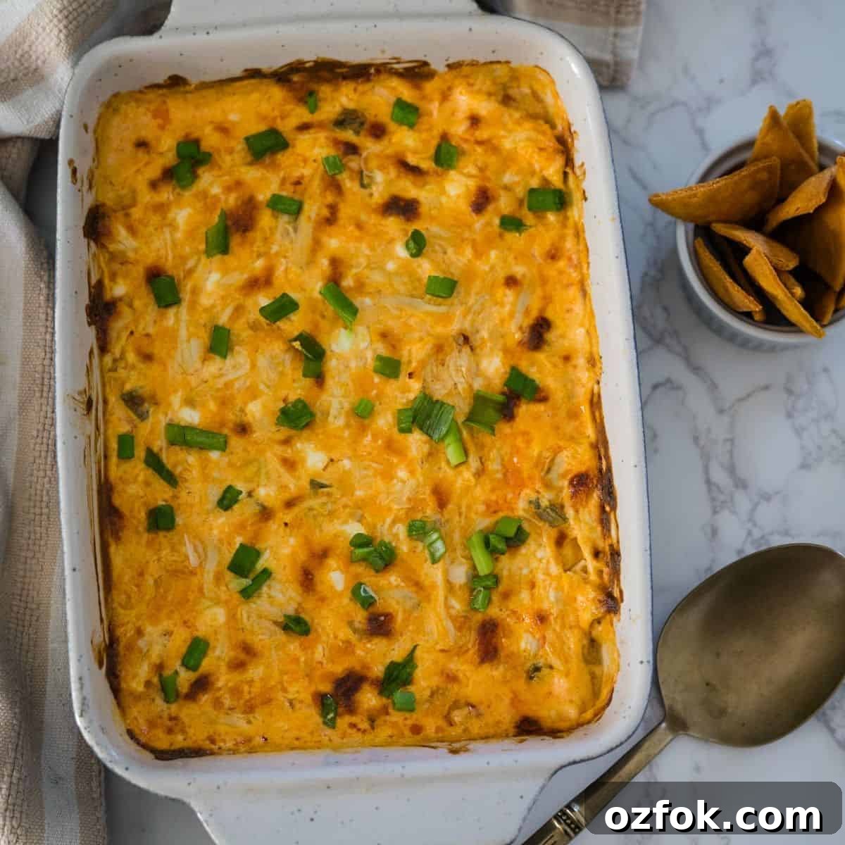 Keto French Onion Dip Recipe for Low-Carb Snacking 13 Cheesy cheesy dip in a white dish.