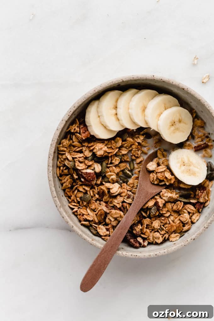 Bowl of granola with banana slices