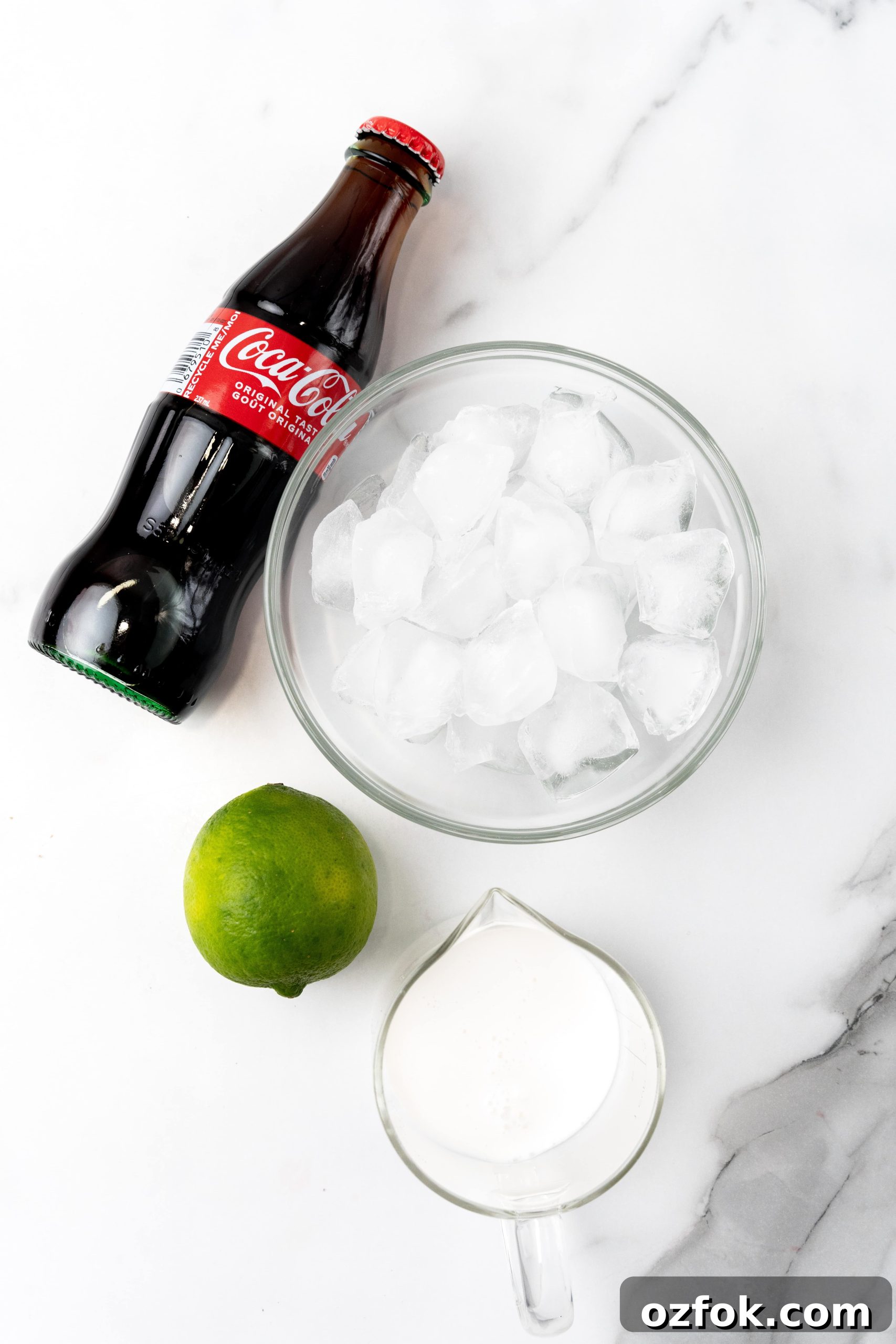 How to Make Viral Dirty Soda at Home: TikTok Recipe Guide 4 an overhead image showing the measured ingredients needed to make a dirty soda drink