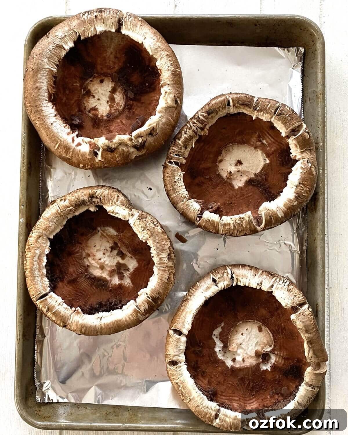4 cleaned portobello mushroom caps.
